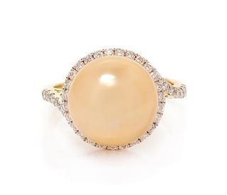 * A 14 Karat Yellow Gold, Cultured Golden South Sea Pearl and Diamond Ring, 3.90 dwts.