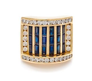 * An 18 Karat Yellow Gold, Sapphire and Diamond Ring, Charles Krypell, 13.90 dwts.