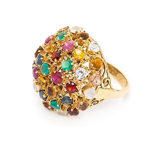 * A 14 Karat Yellow Gold and Multigem Dome Ring, 4.20 dwts.