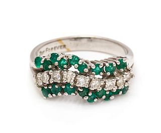 A 14 Karat White Gold, Emerald and Diamond Ring, 3.50 dwts