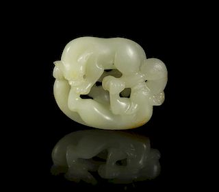A Carved White Jade Toggle, Width 2 3/8 inches.