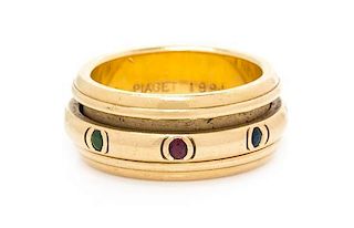 An 18 Karat Yellow Gold and Multigem 'Possession' Spinner Ring, Piaget, 8.70 dwts.