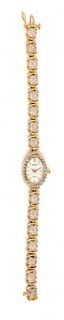 A 14 Karat Bicolor Gold, Mother-of-Pearl and Diamond Wristwatch, Geneve, 11.20 dwts.