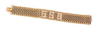 A Bicolor Gold and Diamond ID Bracelet, 38.40 dwts.