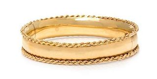 A 14 Karat Yellow Gold Bangle Bracelet, 17.00 dwts.