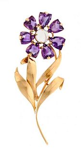 * A Yellow Gold, Amethyst, and Moonstone Flower Motif Brooch, 4.70 dwts.
