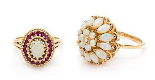 * A Collection of 14 Karat Yellow Gold, Opal and Gemstone Rings, 9.30 dwts.