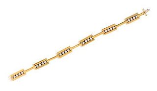 A Bicolor Gold and Diamond Link Bracelet, 26.60 dwts.