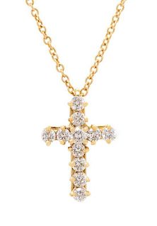 An 18 Karat White Gold and Diamond Cross Pendant, Kurt Wayne, 1.60 dwts.