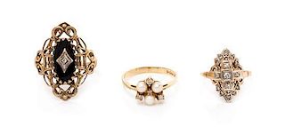 * A Collection of Yellow Gold, Diamond and Gemstone Rings, 4.50 dwts.