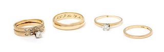 * A Collection of 14 Karat Yellow Gold and Diamond Rings, 8.50 dwts.