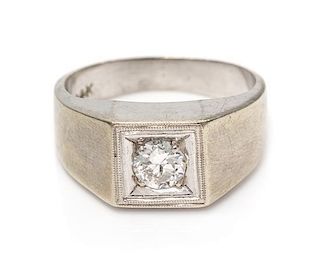 * A 14 Karat White Gold and Diamond Ring, 3.65 dwts.