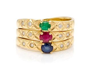 * A Collection of 18 Karat Yellow Gold, Ruby, Sapphire, Emerald and Diamond Stacking Rings, 4.10 dwts.