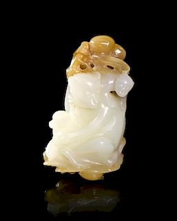 A Carved Jade Toggle of Monkeys, Height 2 3/8 inches.