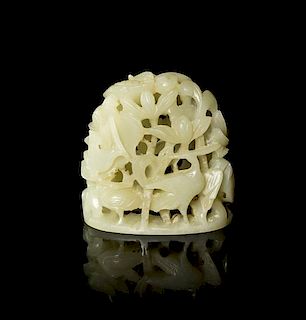 A Carved White Jade Hat Finial, Height 2 3/8 inches.