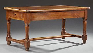 French Provincial Louis XIII Style Carved Cherry Farmhouse Table, late 19th c., the five board top over a wide skirt with two