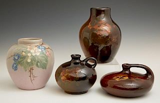 Group of Four Weller Vases, 20th c., three in brown with floral decoration, one of baluster form with painted floral decorati