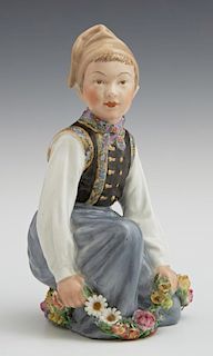 Royal Copenhagen Figurine of an Amager Boy, 20th c. , #12414, H.- 6 in., W.- 3 1/4 in., D.- 3 1/8 in.