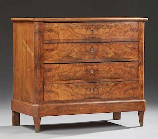 French Louis Philippe Carved Walnut Commode, 19th c., the canted corner top over four drawers, on a plinth base, on tapered s