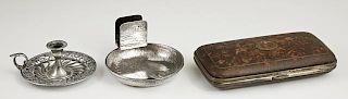 Three Cigar Items, early 20th c., consisting of a leather pocket cigar case, a sterling hand hammered ashtray with matchbox h