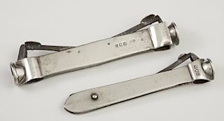 Two Sterling Cigar Cutters, consisting of a double sided example, London, 1916, and a single side example, London, 1897, (2 P