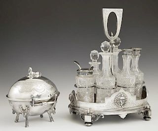 Two Egyptian Motif Silverplated Items, 19th c., consisting of an English cut glass six bottle cruet set by Deykin & Sons; and