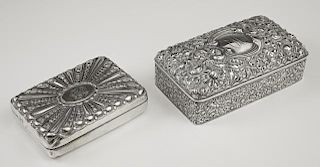 Two Sterling Boxes, one by Gorham, 19th c., marked B920, with repousse floral decoration; the second English, London, 1880, w