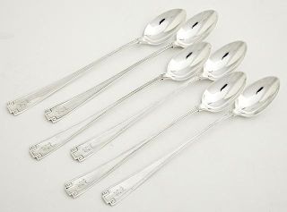 Set of Six Sterling Iced Tea Spoons, c. 1913, by Gorham, in the "Etruscan" pattern, W.- 7 1/2 in., wt.- 5.2 troy oz.