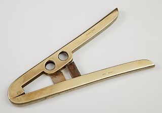 English 9K Yellow Gold Cigar Cutter, early 20th c., designed to cut two different tips, H.- 5 1/4 in., W.- 2 3/4 in., D.- 1/4