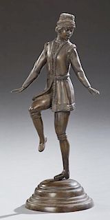 Patinated Bronze of a Male Dancer, 20th c., on a stepped tapering circular base, H.- 21 in., W.- 9 1/2 in., D.- 7 1/4 in.