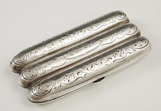 Sterling Three Finger Pocket Cigar Case, early 20th c., with engraved decoration, H.- 5 in., W.- 2 1/2 in., D.- 7/8 in., Wt.-