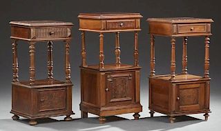 Group of Three French Carved Walnut Marble Top Nightstand, late 19th c., each with an inset figured rouge marble over a friez