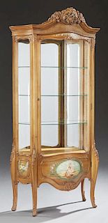 Louis XV Style Carved Cherry Bombe Curved Glass Vitrine, 20th c., the pierced arched crest over an arched curved glass door w