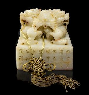 A Carved White Jade Seal, Height 4 x width 4 inches.