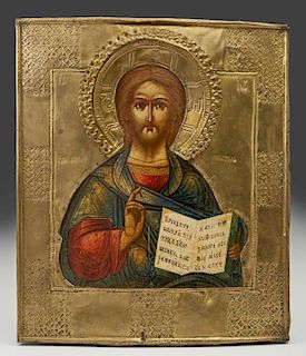 Russian Icon of Christ, 19th c., with a brass oklad, on a curved wooden panel, H.- 12 5/8 in., W.- 10 1/2 in.