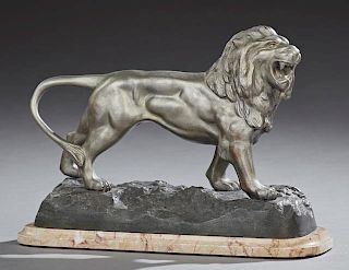 French Patinated Spelter Lion Figure, early 20th c., on a stepped highly figured tan marble base, H.- 11 in., W.- 15 1/2 in.,