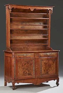 French Provincial Louis XV Style Carved Inlaid Walnut Vaisselier, mid 19th c., the finial mounted inlaid back with four plate