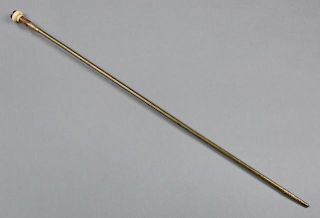 Ivory and Brass Sword Cane, early 20th c., The turned ivory handle mounted with an agate stone, atop a four sided sword, Swor