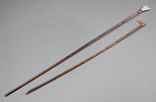Group of Two Canes, early 20th c., one of bamboo with a celluloid L-shaped handle; the second with a wide mother-of-pearl han