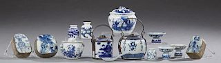 Group of Fourteen Pieces of Chinese Blue and White Porcelain, late 19th c., consisting of four covered jars, a spoon rest, th
