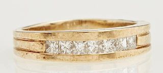Man's 14K Yellow Gold Dinner Ring, the center with a row of 7 channel set princess diamonds, on a ribbed band, total diamond 