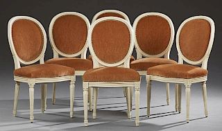 Set of Six Louis XVI Style Polychromed Beech Dining Chairs, 20th c., the medallion backs over bowed seats on fluted tapered l