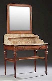 French Carved Mahogany Louis XVI Style Marble Top Washstand, early 20th c., with an arched mirror over a highly figured ocher