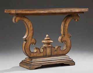 Carved Walnut Console Table, 20th c., the rectangular top raised on serpentine scrolled supports, to a stepped base on bracke