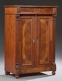French Empire Style Carved Burl Walnut Sideboard, 19th c., the stepped top over a frieze drawer above double cupboard doors f