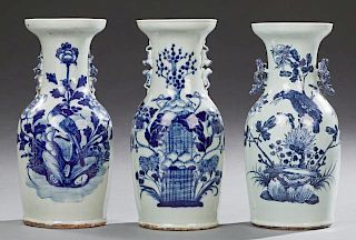 Group of Three Chinese Blue and White Baluster Vases, late 19th c., one with bird and flower decoration and applied floral ha