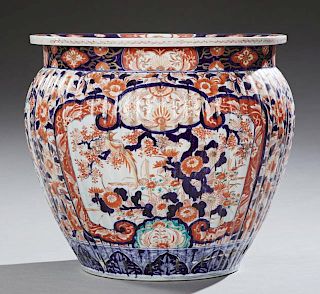 Large Imari Porcelain Jardiniere, 20th c., of ribbed baluster form, with floral and bird decoration, H.- 16 1/2 in., Dia.- 17
