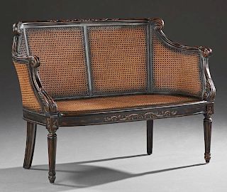 Louis XVI Style Carved Mahogany Settee, 20th c., the carved double caned back to caned curved arms, over a bowed caned seat, 