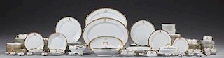 Assembled Set of One Hundred Forty-Nine Pieces of White Porcelain Dinnerware, with gilt rims, some monogrammed "A" containing