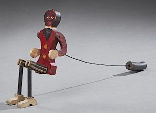 African American Folk Art Dancing Man Toy, early 20th c., with an articulated body, on a wire rod with a handle, Figure- H.- 